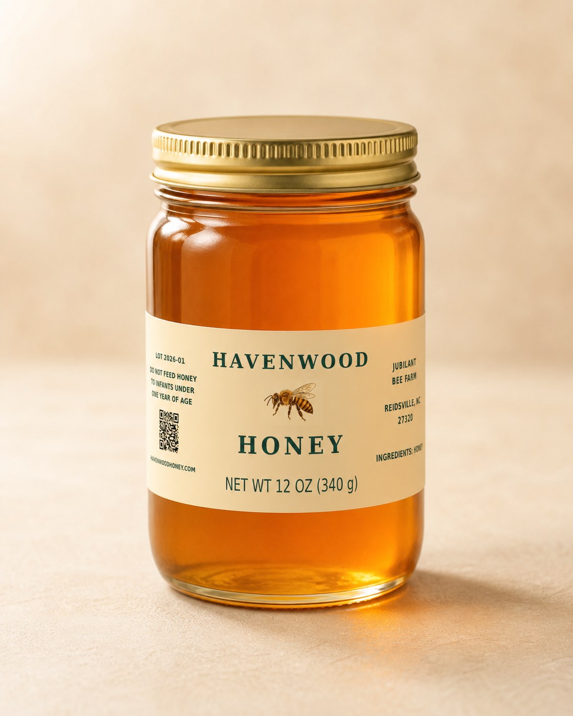 Presentation visualization of a gold-lidded Havenwood Honey jar filled with amber honey